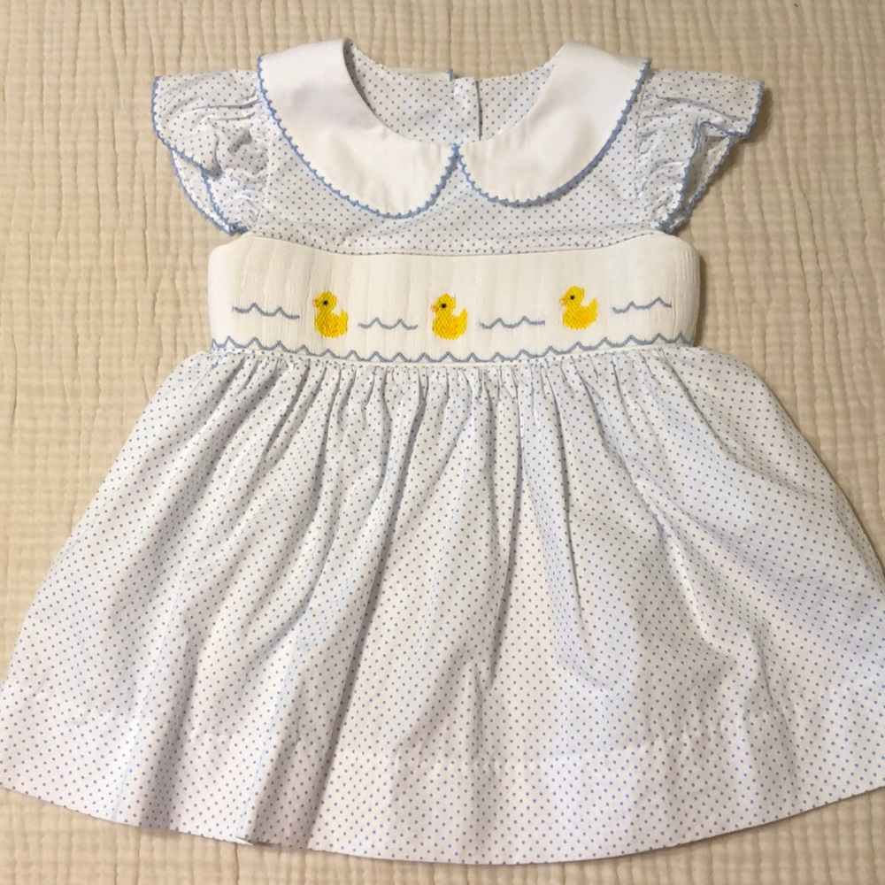 blue and white polka dot smocked dress
